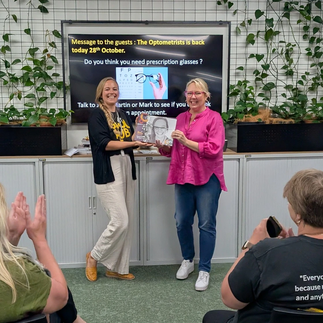 Our-Partners Soul-Hub Megan-accepting-the-2025-Calendar